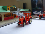 54 Massey Ferguson 50B Tractor with shovel orange and white
