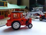 54 Massey Ferguson 50B Tractor with shovel orange and white