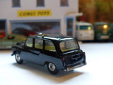418 Austin London Taxi with driver (restored)