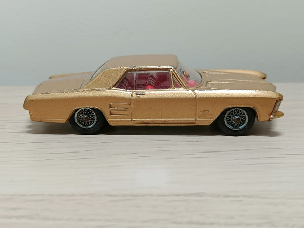245 Buick Riviera in gold