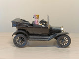 9011 Ford 1915 model T with passengers