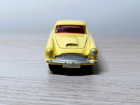218 Aston Martin in yellow with cast wheels