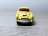 218 Aston Martin in yellow with cast wheels