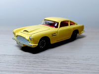 218 Aston Martin in yellow with cast wheels