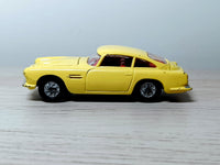 218 Aston Martin in yellow with cast wheels