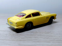 218 Aston Martin in yellow with cast wheels