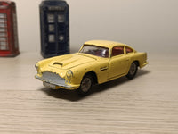 218 Aston Martin in yellow with cast wheels