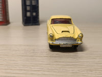 218 Aston Martin in yellow with cast wheels