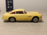 218 Aston Martin in yellow with cast wheels