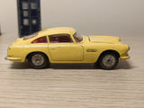 218 Aston Martin in yellow with cast wheels