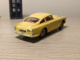 218 Aston Martin in yellow with cast wheels
