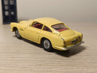 218 Aston Martin in yellow with cast wheels