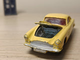 218 Aston Martin in yellow with cast wheels
