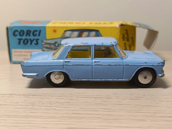 217 Fiat 1800 in blue with bright yellow seats *in original box*