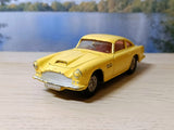 218 Aston Martin in yellow with cast wheels
