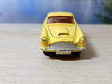 218 Aston Martin in yellow with cast wheels