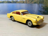 218 Aston Martin in yellow with cast wheels