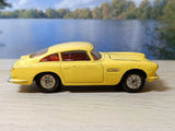 218 Aston Martin in yellow with cast wheels