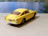 218 Aston Martin in yellow with cast wheels