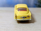 218 Aston Martin in yellow with cast wheels