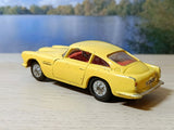 218 Aston Martin in yellow with cast wheels