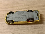 218 Aston Martin DB4 yellow with free spinning wheels