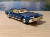 264 Oldsmobile Toronado *with shaped wheels* and original box