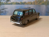 418 Austin Taxi with red interior and tinted windows