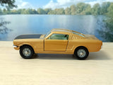 320 Ford Mustang *in gold and black*