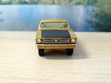 320 Ford Mustang *in gold and black*