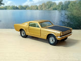 320 Ford Mustang *in gold and black*