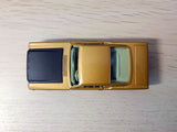 320 Ford Mustang *in gold and black*