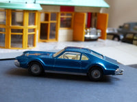 264 Oldsmobile Toronado in deep blue with tow bar