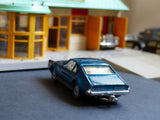 264 Oldsmobile Toronado in deep blue with tow bar