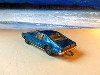 264 Oldsmobile Toronado in bright blue-turquoise with tow bar