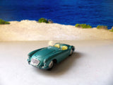 302 MGA in pale metallic green with yellow seats