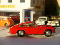 218 Aston Martin DB4 red *rare with fixed shaped wheels*