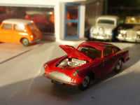 218 Aston Martin DB4 red *rare with fixed shaped wheels*