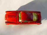 218 Aston Martin DB4 red *rare with fixed shaped wheels*