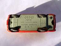218 Aston Martin DB4 red *rare with fixed shaped wheels*