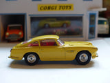 218 Aston Martin DB4 yellow *rare with fixed shaped wheels*(1)