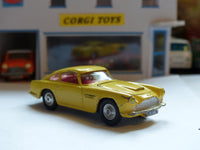 218 Aston Martin DB4 yellow *rare with fixed shaped wheels*(1)