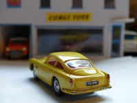 218 Aston Martin DB4 yellow *rare with fixed shaped wheels*(1)