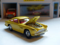 218 Aston Martin DB4 yellow *rare with fixed shaped wheels*(1)