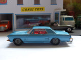 245 Buick Riviera in metallic blue with cast wheels