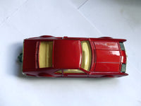 276 Oldsmobile Toronado in metallic red