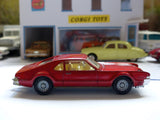 276 Oldsmobile Toronado in metallic red with original box