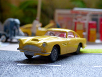 218 Aston Martin in yellow with cast wheels