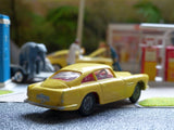 218 Aston Martin in yellow with cast wheels
