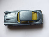 218 Aston Martin in silver with lemon interior